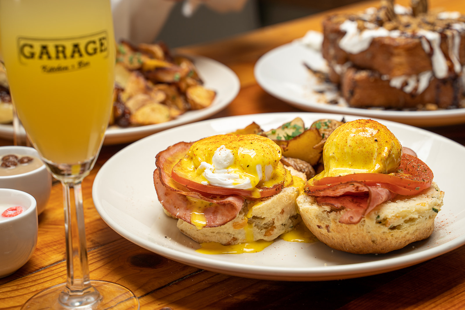 Traditional brunch with eggs benedict and bottomless mimosas at Garage Kitchen + Bar in San Diego's Gaslamp Quarter